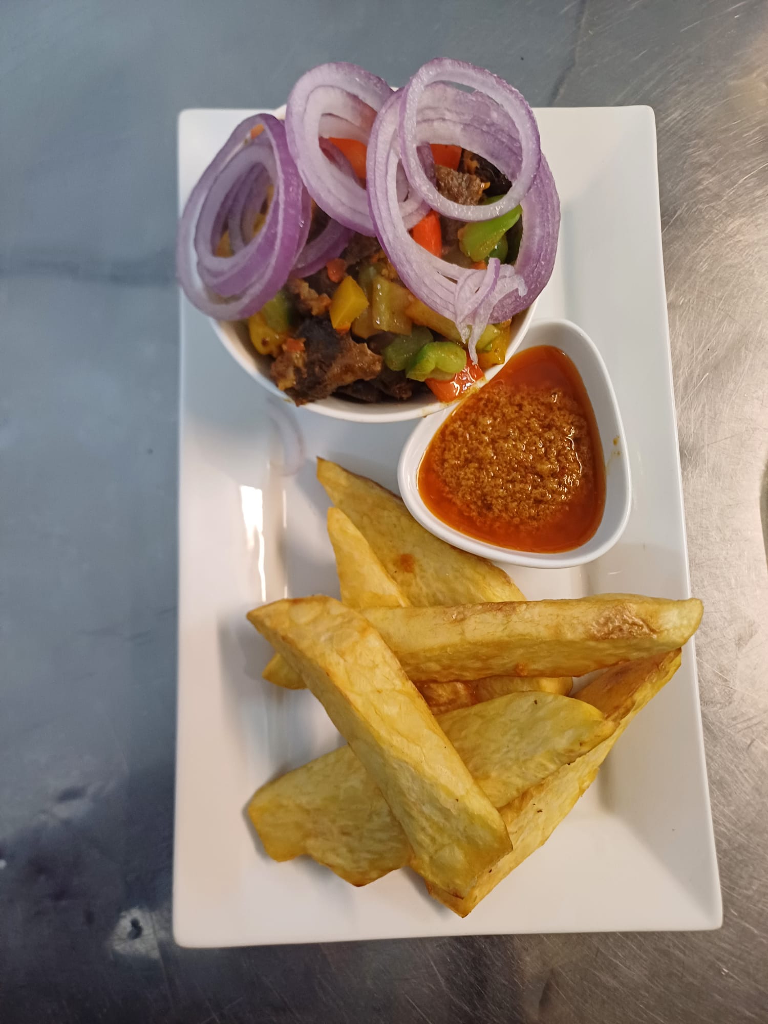 Beef and fried plantain or yam